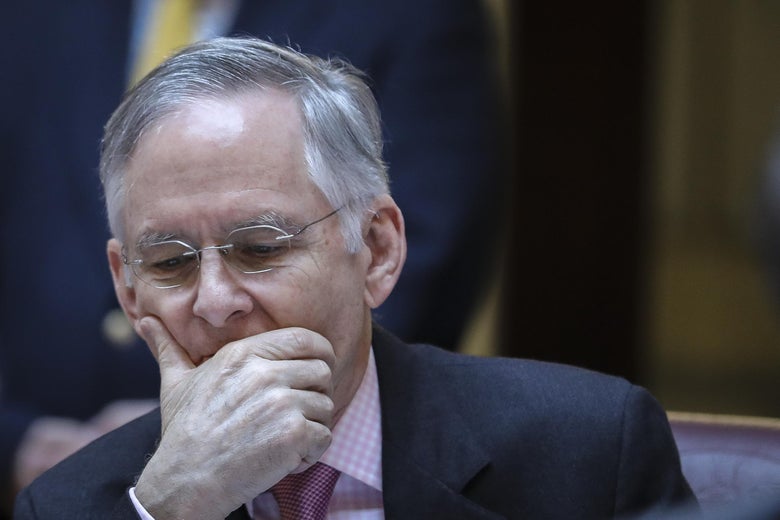 Tommy Norment sits at his desk on the Senate floor at the Virginia State Capitol in Richmond, Virginia.